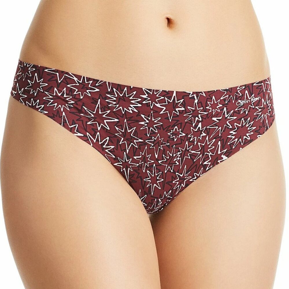 Calvin Klein Women's Invisibles Thong Panty Underwear, Layered Starburst, Large
